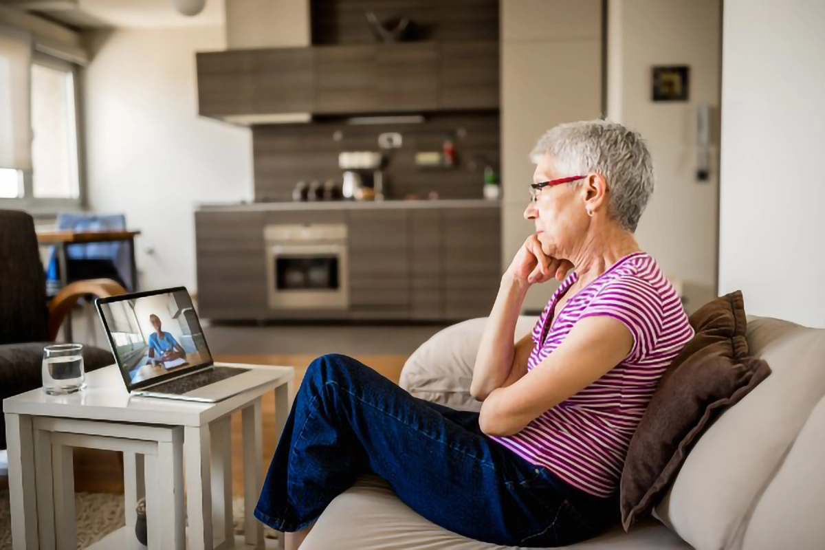 someone watching videos on a tablet